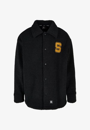 Jachetă din fleece neagră cu închidere cu butoane, guler ascuțit și logo galben "S" pe partea stângă a pieptului. Textură moale și croială confortabilă.