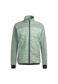 Chaqueta verde clara con cierre de cremallera, que presenta un panel frontal acolchado, cuello alto y detalles negros en los puños y el dobladillo.