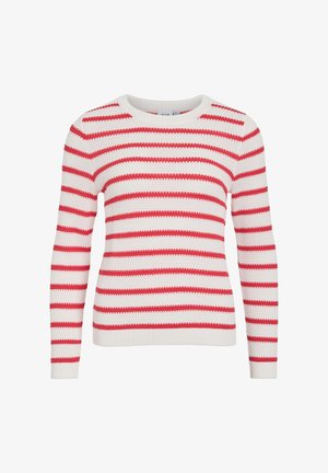 Balts džemperis ar sarkanām horizontālām svītrām, apaļu kakla izgriezumu un garām piedurknēm. Redzama adījuma faktūra, kas piešķir dziļumu.