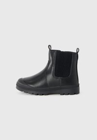 Black leather ankle boots with ribbed elastic side panels, textured soles, pull tabs, rounded toe, and a smooth finish.