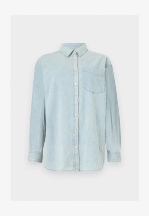 Šviesiai mėlyna džinsinė ilgomis rankovėmis marškiniai su apykakle, baltais mygtukais priekyje ir krūtinės kišene kairėje pusėje.