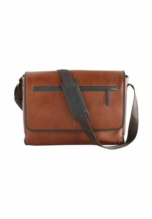 Brown leather messenger bag with a flap closure, dark brown accents, an adjustable strap, and a front slip pocket. Smooth texture and structured shape.