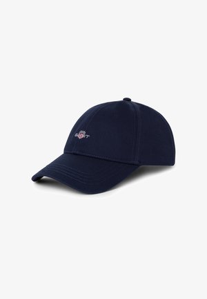 Gorra de béisbol azul marino hecha de algodón con visera curvada, que presenta un logo en el frente y acentos cosidos. Diseño clásico de seis paneles.