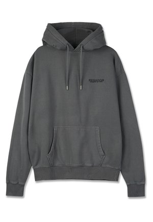 Siva kapuča iz bombaža. Ima sprednji žep, rebraste manšete in rob. Na prsih je natisnjena blagovna znamka.