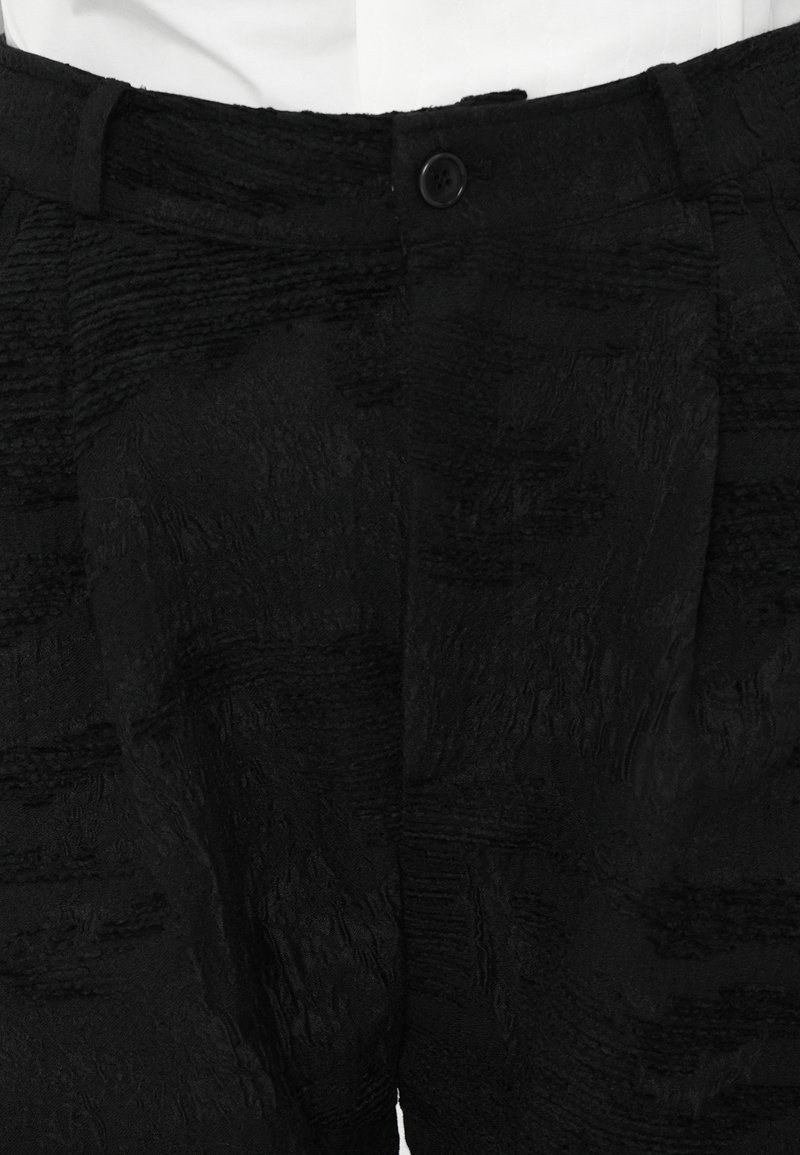 Henrik Vibskov ONE PANTS - Trousers - fishes black