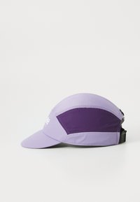 Purple running cap featuring a curved brim, mesh panels, and contrasting fabric sections. Includes brand logo on the front side.