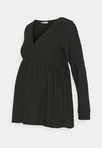 Černý těhotenský top s dlouhým rukávem a výstřihem do V, z texturované látky s puntíky, s nařaseným pasem a volným střihem pro pohodlí.