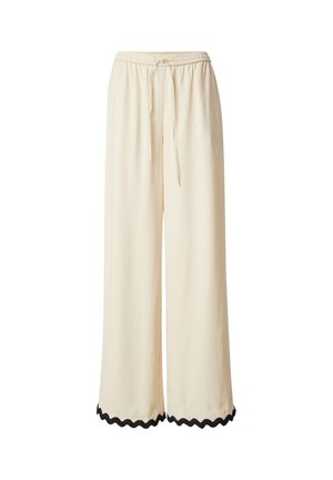 Crème kleurige wijde broek met een elastische tailleband en een trekkoord. De onderzoom heeft zwarte geschulpte details. Zacht, licht materiaal.