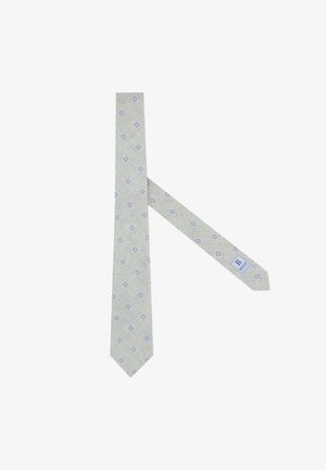 Lichtgrijze stropdas met een subtiel blauw bloemendotpatroon en een klein blauw merkembleem nabij het smalle uiteinde.