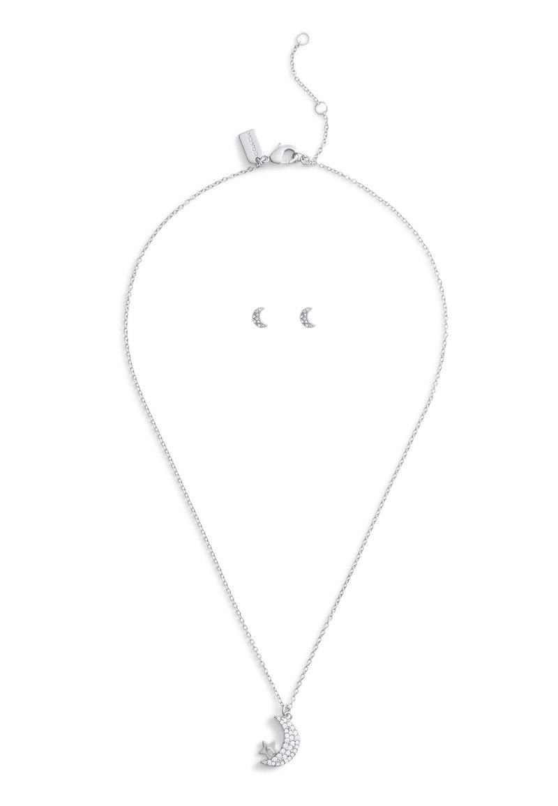 Collier en argent avec un pendentif en forme de lune orné de pierres claires ; comprend des boucles d'oreilles en forme de croissant assorties.