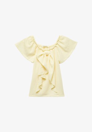 Keltainen olkaimeton paita, jossa on rypytetyt hihat ja etuosan nauhakiinnitys. Valmistettu tekstuurillisesta kankaasta, jossa on rento istuvuus ja pehmeä laskeutuminen.