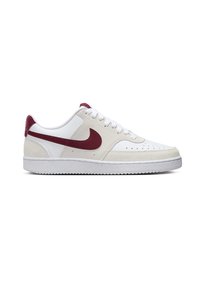 White sneaker with red accents, featuring a textured suede and smooth leather design, white rubber sole, and perforated toe for breathability.