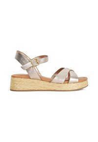 Gold metallic wedge sandal with braided straw platform sole, ankle strap, and buckle closure.