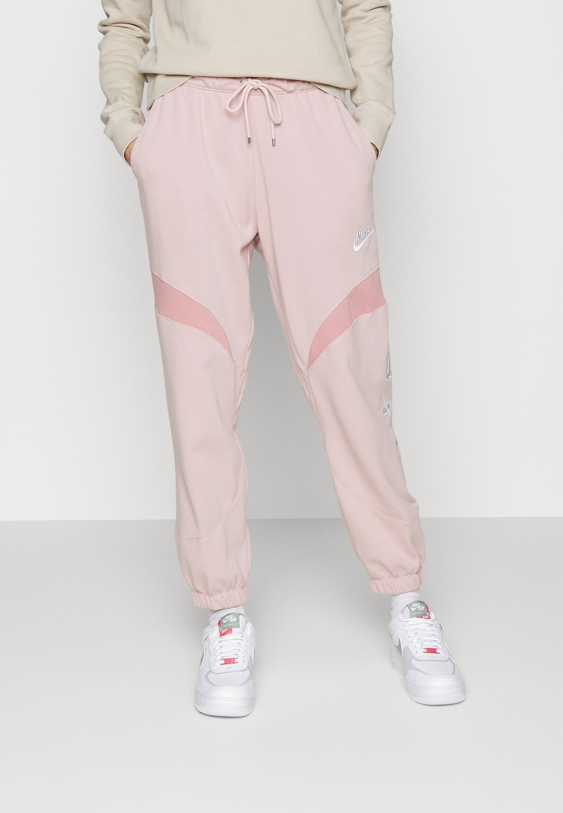 pink nike cargo tracksuit