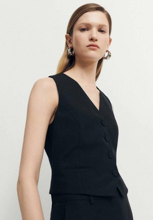 Mango JORDAN - Strukirani kaput - black