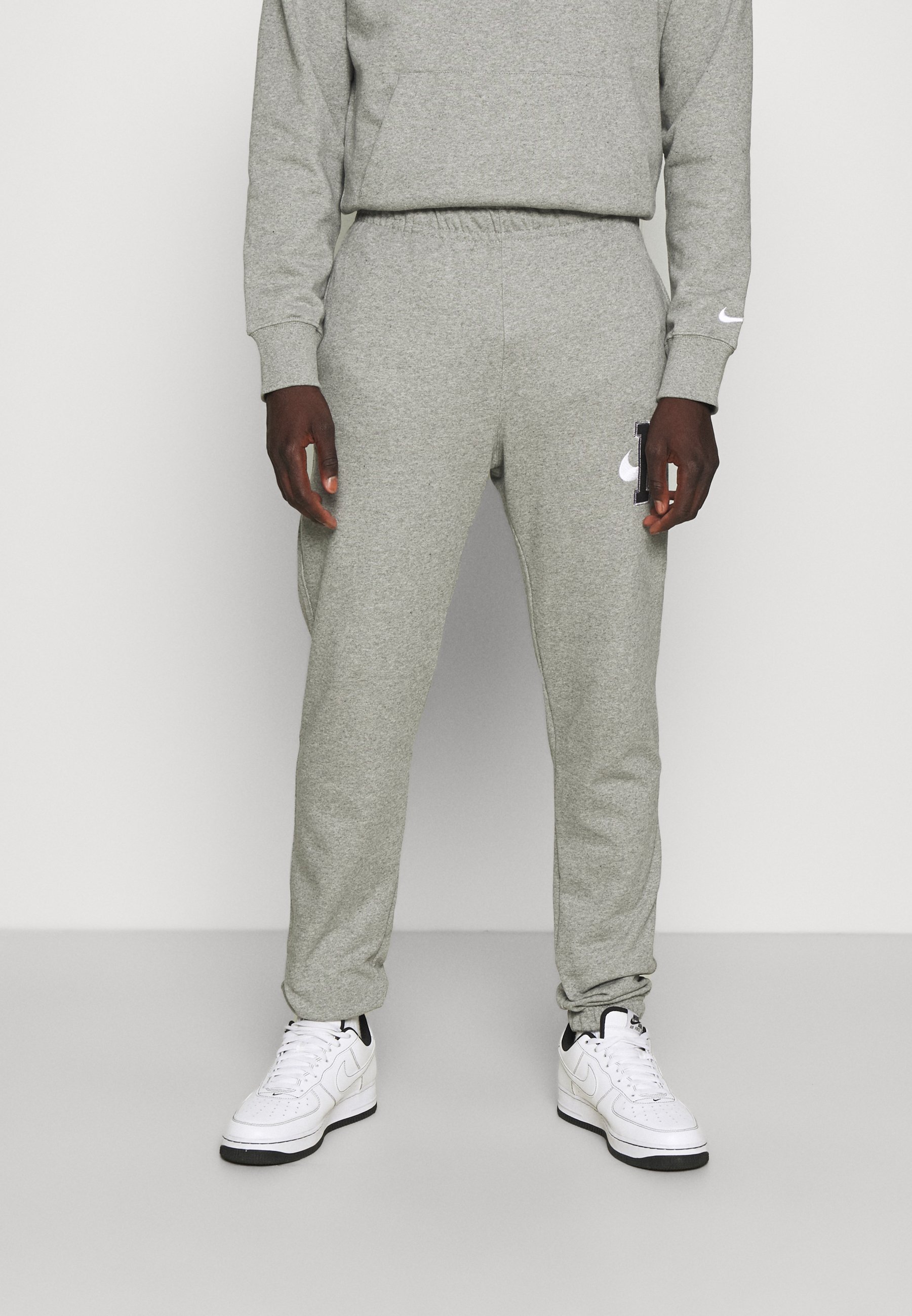 Nike Sportswear RETRO PANT - Pantalones deportivos - dark grey heather/gris  oscuro - Zalando.es