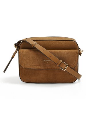 Brown leather and suede crossbody bag with front flap pocket, adjustable strap, and gold-tone buckle and zipper details.