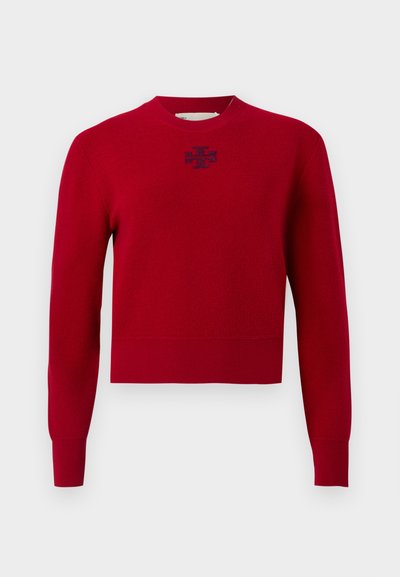 Red long-sleeve crewneck sweater with ribbed cuffs and hem, featuring a small dark logo centered below the neckline.