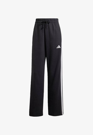 Zwarte sweatpants met een koord in de taille, witte zijstrepen en een klein wit logo op het linkerpand. Gemaakt van zachte stof voor comfort.