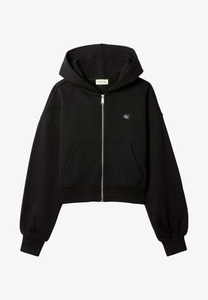 Must cropped lukuga dressipluus esi taskute, lõdva lõikega, elastsete mansettidega ja väikese Calvin Kleini logoga rinnal.