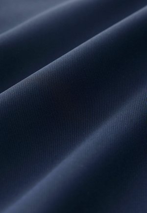 Tissu bleu marine à texture lisse, ornée de motifs légèrement en relief. Le matériau semble léger et durable, avec une finition mate.