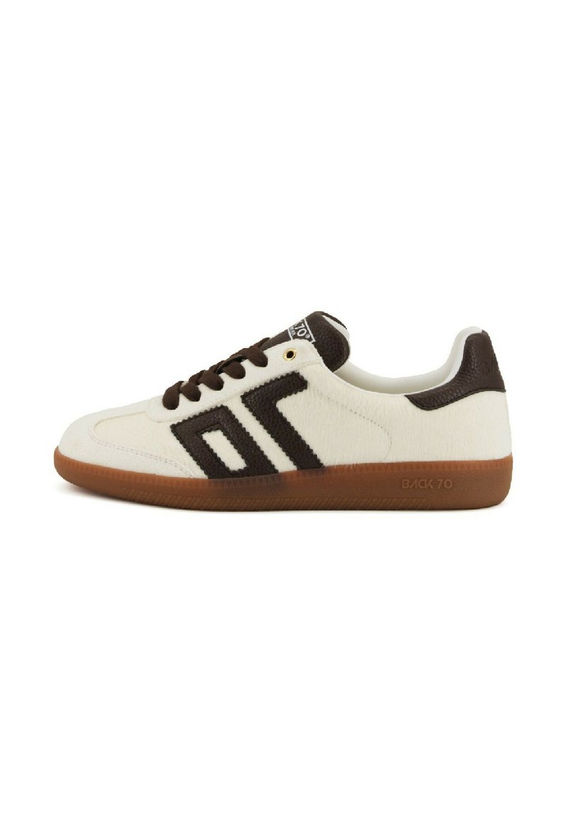 White low-top sneaker with brown laces, a brown geometric design on the side, and a gum sole labeled "BACK 70."