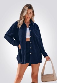 CUPSHE Mini-rok voor dames, kunstleer, A-lijn, korte modieuze rok, vrijetijdskleding, Bruin, M