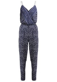 Navy floral jumpsuit with thin straps, a cross-body design, and an elastic waistband. Features a leaf pattern throughout. Soft fabric.
