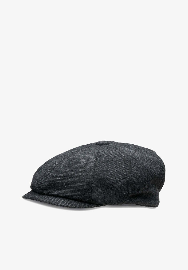 Dark gray wool flat cap with a rounded crown, prominent peak, and textured fabric. Features a small top button and understated stitching.
