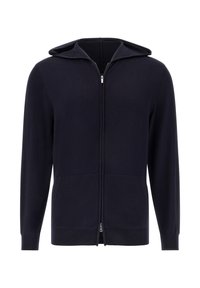 Jūros mėlynumo zip-up džemperis pagamintas iš švelnios medžiagos, su visu užtrauktuku, priekinėmis kišenėmis ir ribotais rankogaliais. Lygi tekstūra ir minimalizmo dizainas.