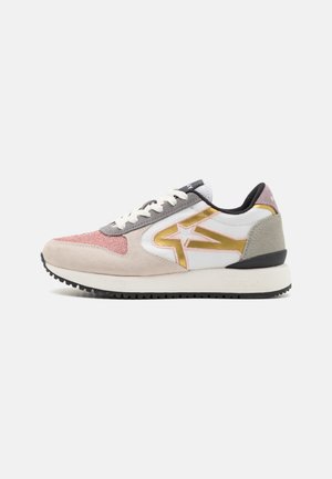 Multicolor sneaker with a mix of suede and mesh materials; features a gold accent, round laces, and a textured rubber sole.