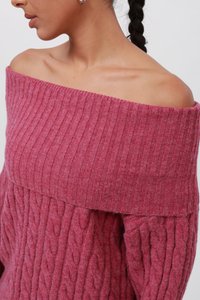 Ribbed knit off-shoulder sweater in a deep rose color, featuring cable patterns and a folded neckline for a relaxed fit.