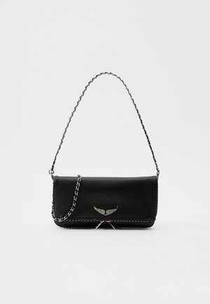 Black leather handbag with a silver chain strap, featuring decorative wing accents and white stitching along the bottom seam.