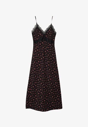 Zwarte nachtjapon met verstelbare spaghettibandjes, kantafwerking en een klein bloemenpatroon in oranje en wit overal. Zachte stoftextuur.