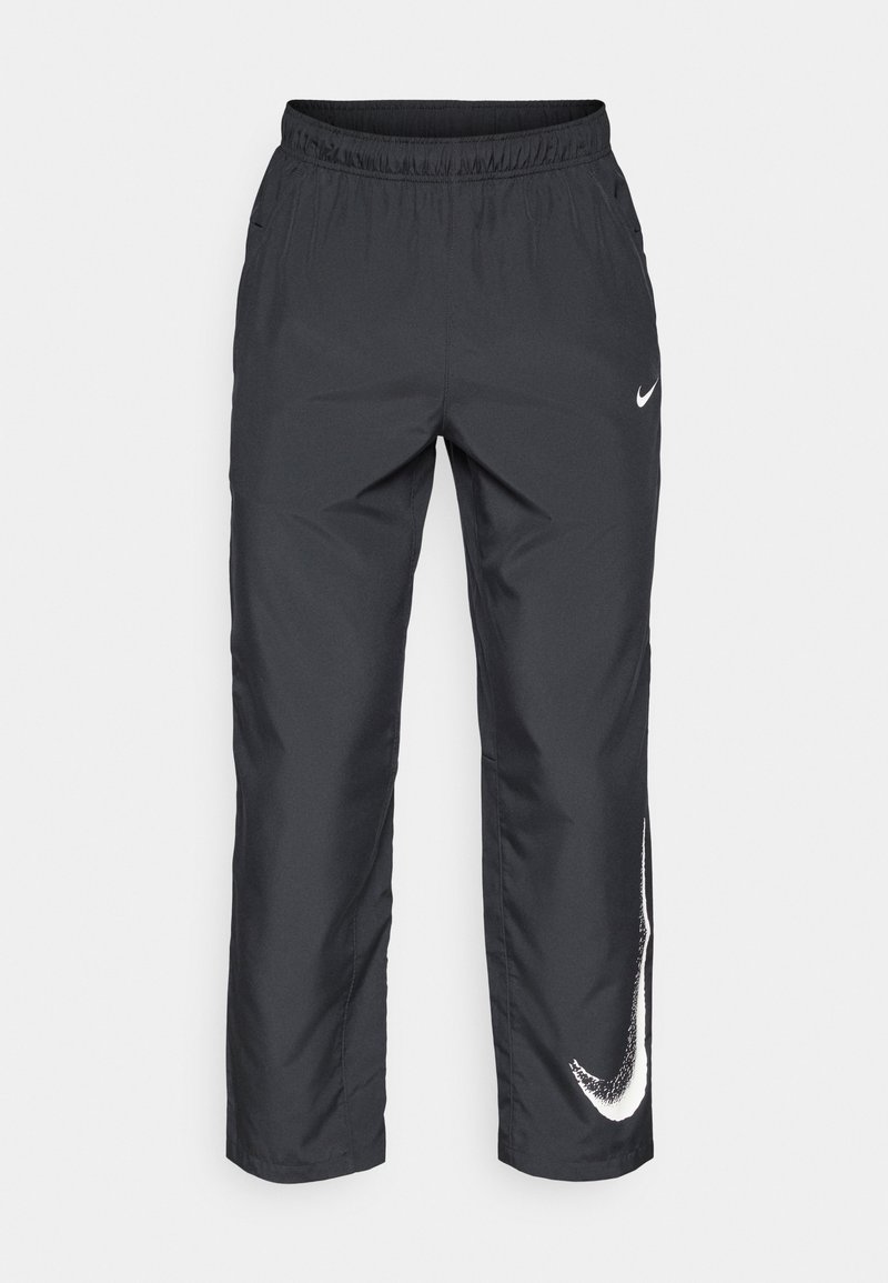 Nike Performance FORM - Tracksuit bottoms - black - Zalando.ie