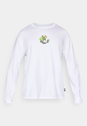 Baltas ilgomis rankovėmis marškinėlis iš medvilnės. Ant krūtinės spalvingas siuvinėtas varlės ir grybo raštas. Klasikinė apvali apykaklė.