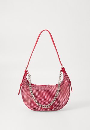 Red perforated handbag with a curved shape, featuring a silver chain accent and a matching shoulder strap. Logo displayed on the front.