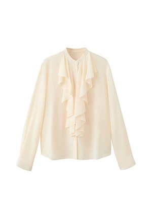 Blusa de crema de manga larga con botones en el frente y detalle de volantes superpuestos a lo largo del pecho y el área del cuello sobre fondo blanco.