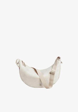 Beige crescent-shaped crossbody bag with adjustable strap, zipper closure, and "GOT BAG" logo on front center.