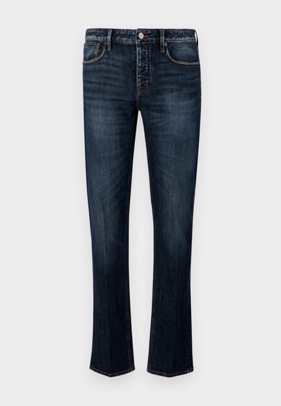 Dark blue denim jeans with a straight leg design, featuring five pocket style, visible stitching, and a button and zipper closure.