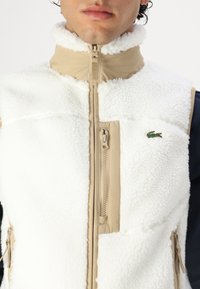 Lacoste Vestă - flour/viennese