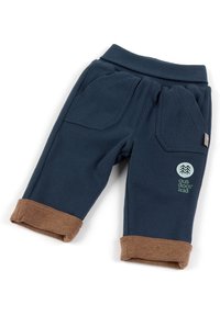 Pantalon bleu marine pour tout-petits avec poignets en polaire marron, taille élastique, deux poches devant et logo "enfant d'extérieur" avec icône d'arbre sur la jambe.