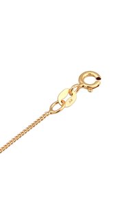 Guld kædearmbånd med fint länkdesign, udstyret med en klipslås og en glat, skinnende overflade. Bemærkelsesværdig mærketag vedhæftet.