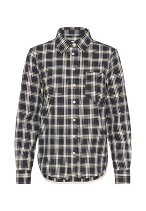 Tumedate ja kreemjat plaidi mustriga nööpidega särk pikkade varrukatega, krae ja rinna taskuga; valmistatud kergest kangast, millel on sile tekstuur.