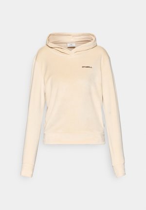 Cremefarbene Kapuzenjacke aus weichem Material, mit einer Kängurutasche und einem Logo auf der Brust. Lange Ärmel mit passenden Bündchen.