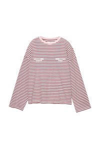 Langærmet skjorte med afslappet pasform i lyserød med bordeaux horisontale striber. Har to hvide teksttryks på fronten. Blødt bomuldsmateriale.