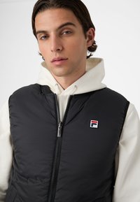 Fila REVERSIBLE  - Väst - black