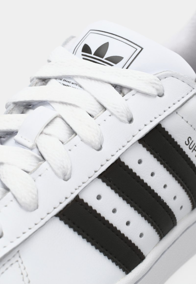 adidas gazelle silver green womens ADIDAS ORIGINALS Men's Black and White Superstar Sneakers  Pavidas