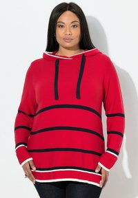 Czerwona bluza z kapturem z granatowymi poziomymi paskami, d�ługimi rękawami, przednią kieszenią i ściągaczem przy kapturze. Miękki materiał o luźnym kroju.