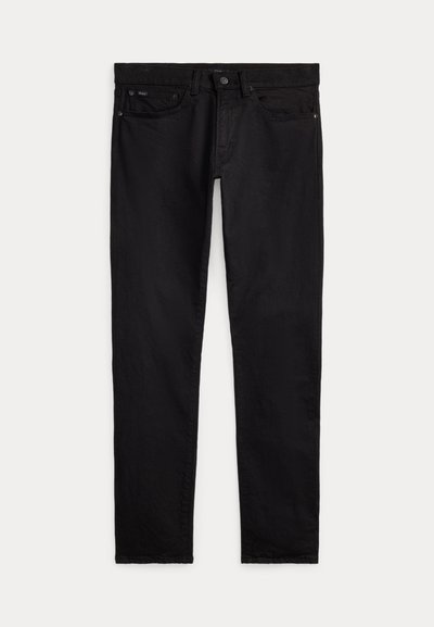 Mustad slim-fit teksapüksid esikülje ja tagakülje taskutega, vööaasadega ning nööbi ja lukuga sulguri, laotatud valgele taustale.